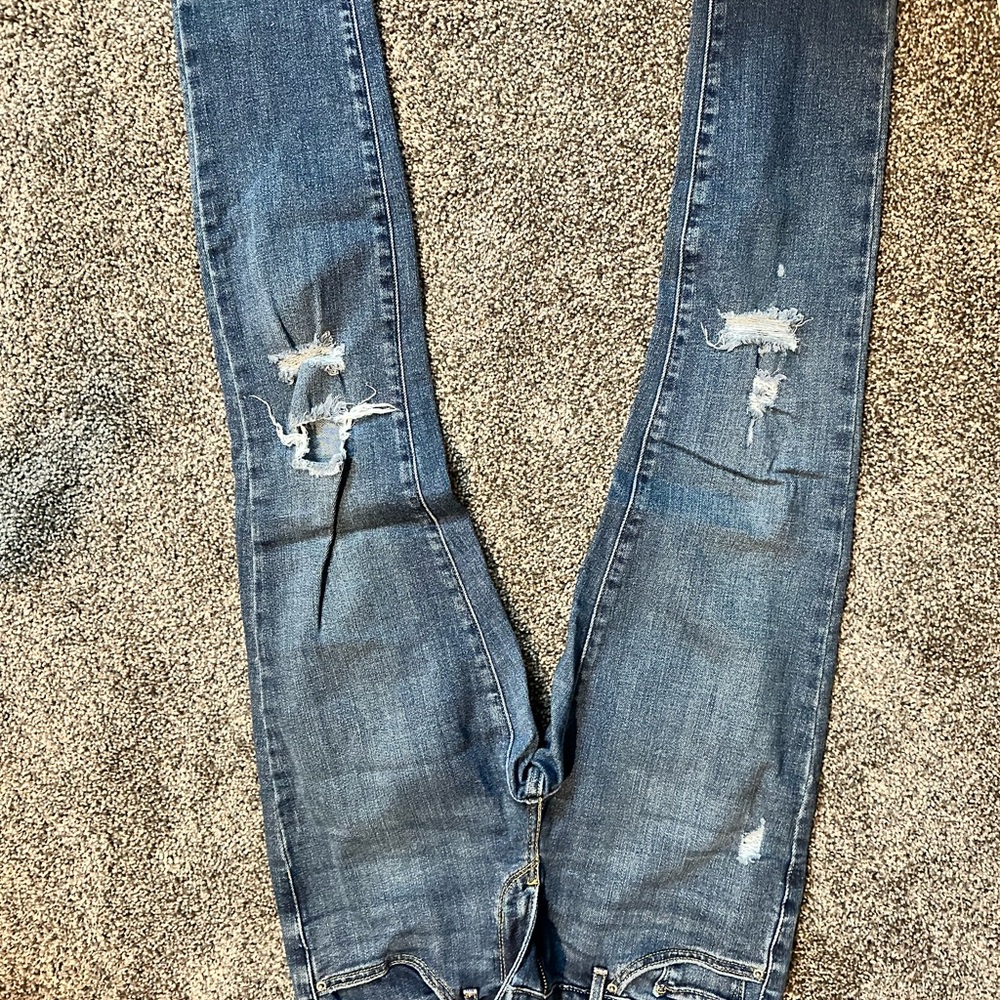 Distressed Blue Jeans